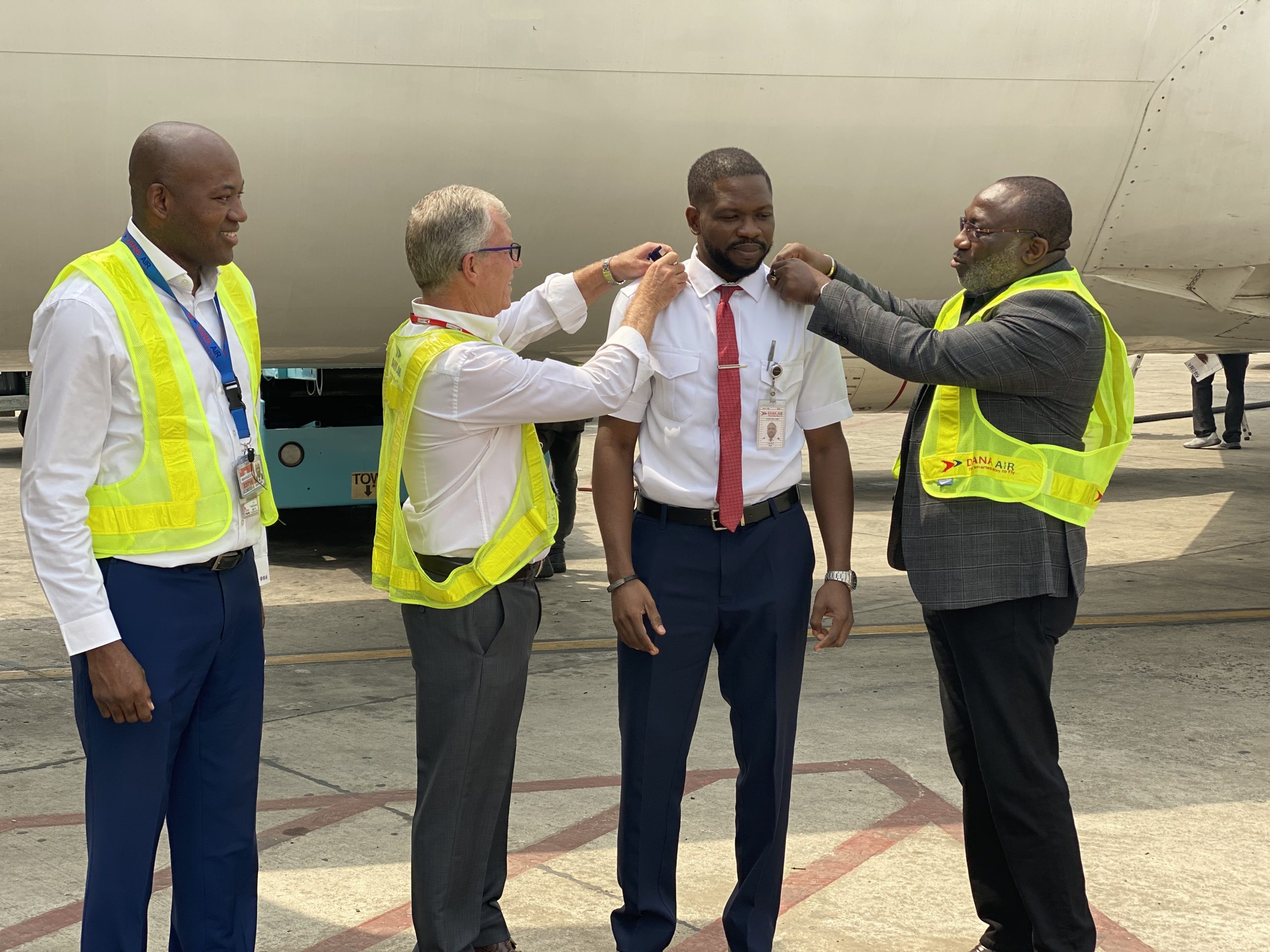 Dana Air decorates new captain, to recruit more Nigerian pilots