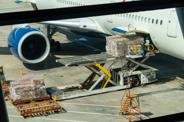 scene of loading luggage and cargo to airplane with handling operations in airport travel and 1