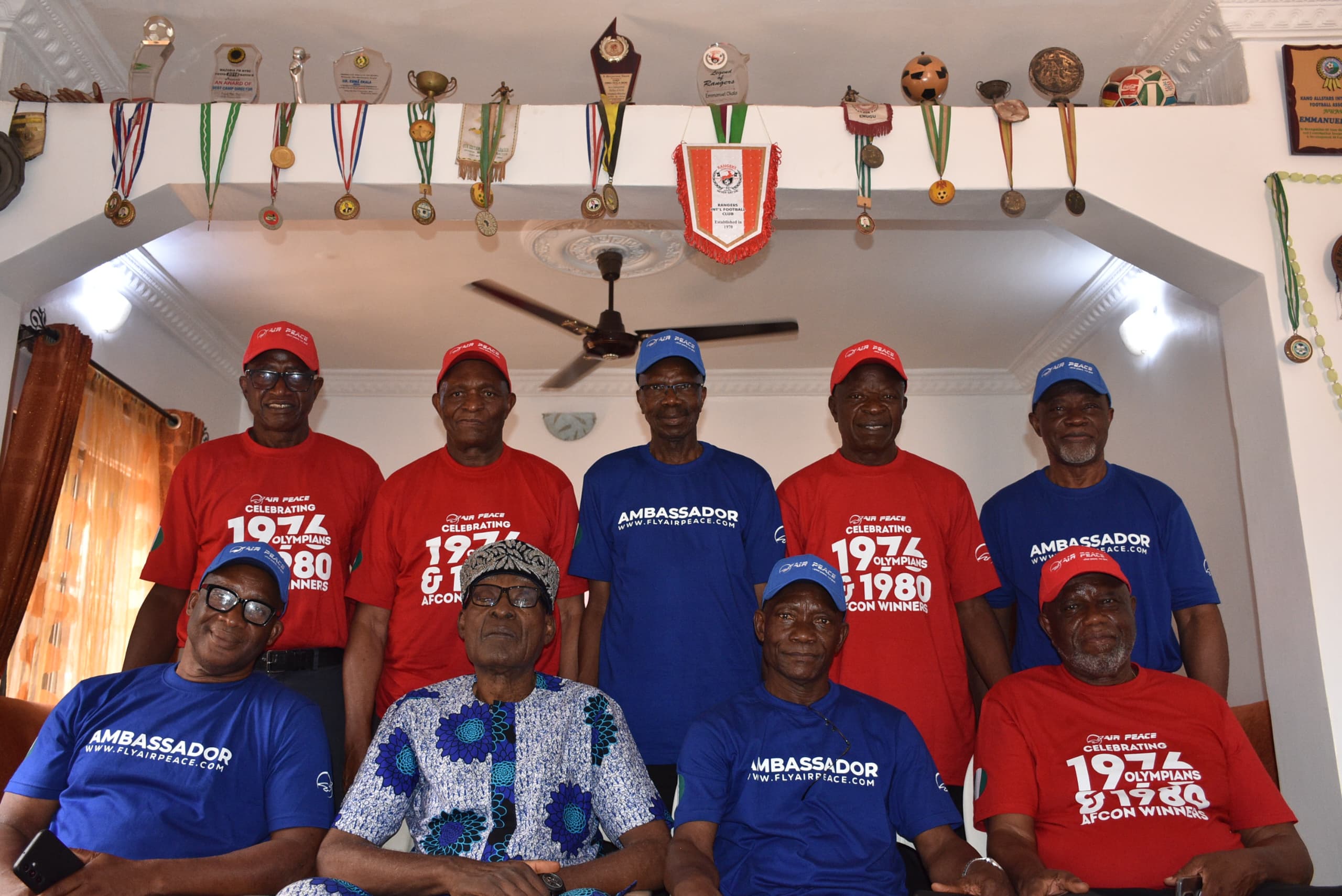 Air Peace Ambassadors Pay Tribute to Late Football Legend Christian Chukwu in Enugu
